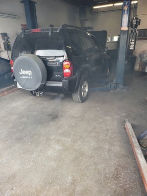 Vehicle inside the rear detailing bay at Machos Auto Detail